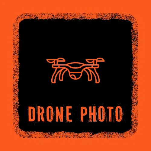 Aerial drone photo of a property and its surrounding area